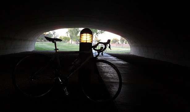 Trail Running Through a Lit Tunnel